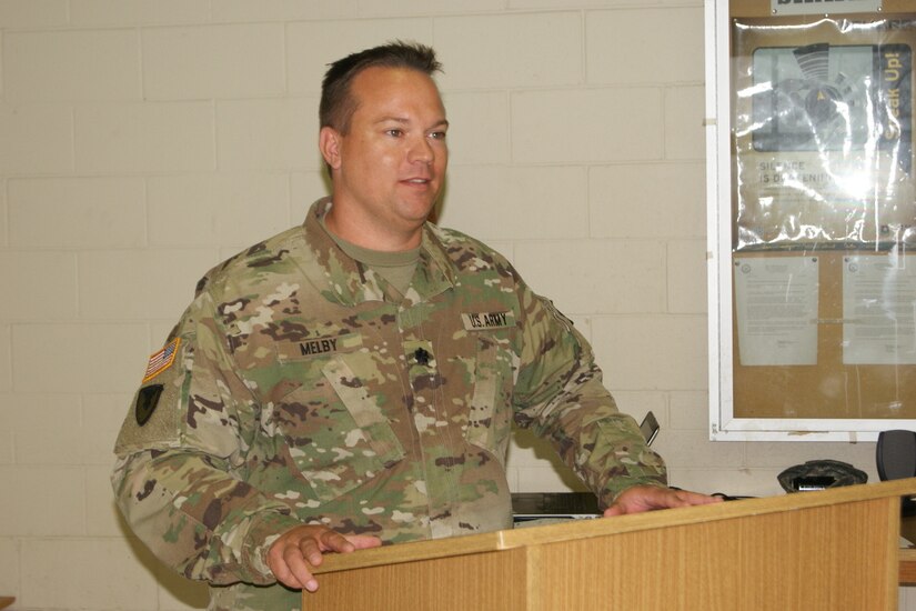 Lt. Col. Ryan Melby, commander of the 3rd Battalion, 399th Regiment, says farewell at the battalion's deactivation ceremony at the Army Reserve Center in Sturtevant, Wis., Dec. 3, 2016.