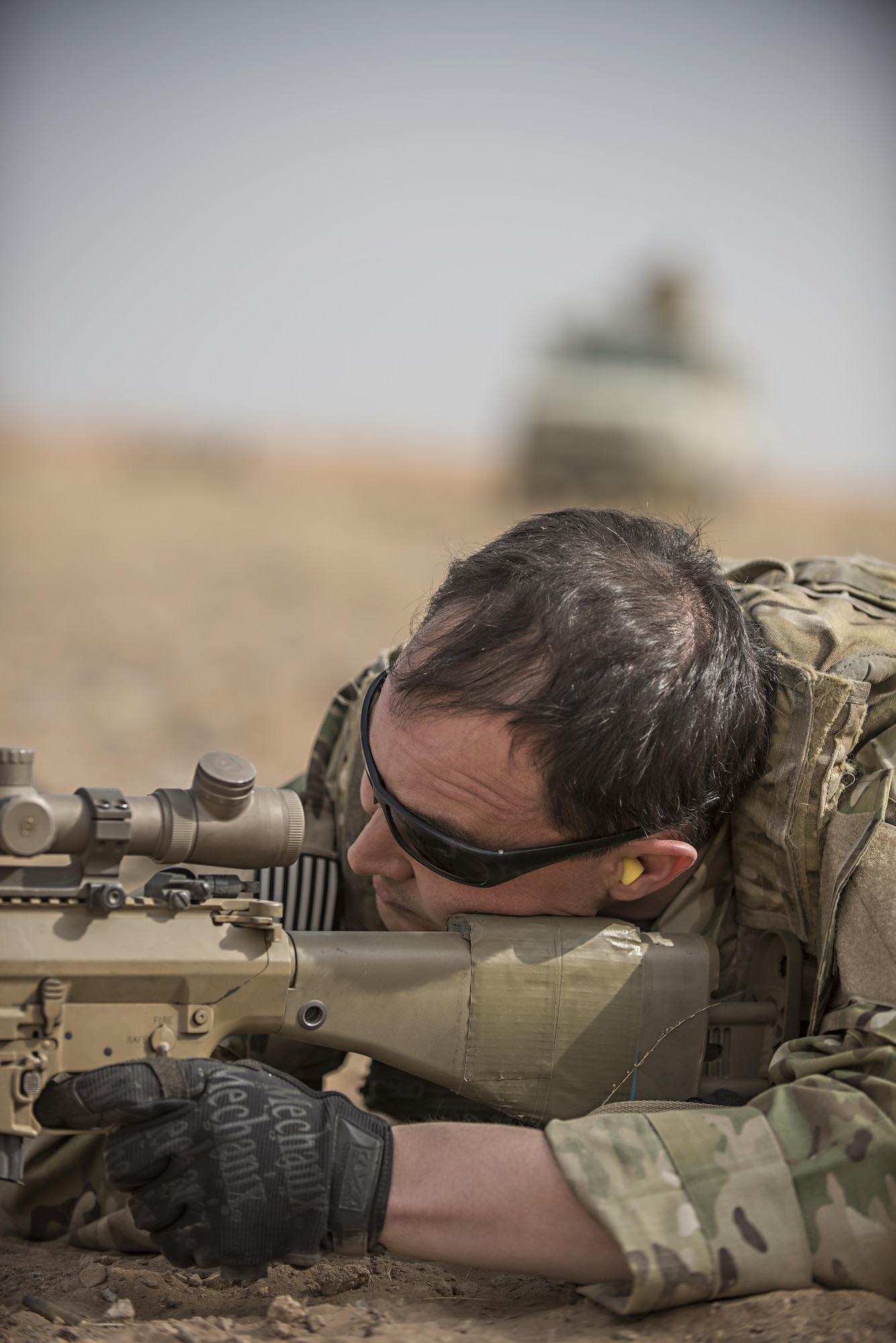 Tech. Sgt. Jeremy Rarang, 817th Expeditionary Air Support Operations Squadron joint terminal attack controller, fires an M110 Semi-Automatic Sniper System during training at Forward Operating Base Dahlke, Afghanistan Nov. 21, 2016. JTACs are often assigned to sister service units to bridge the gap between air and ground assault operations. (U.S. Air Force photo by Staff Sgt. Katherine Spessa)