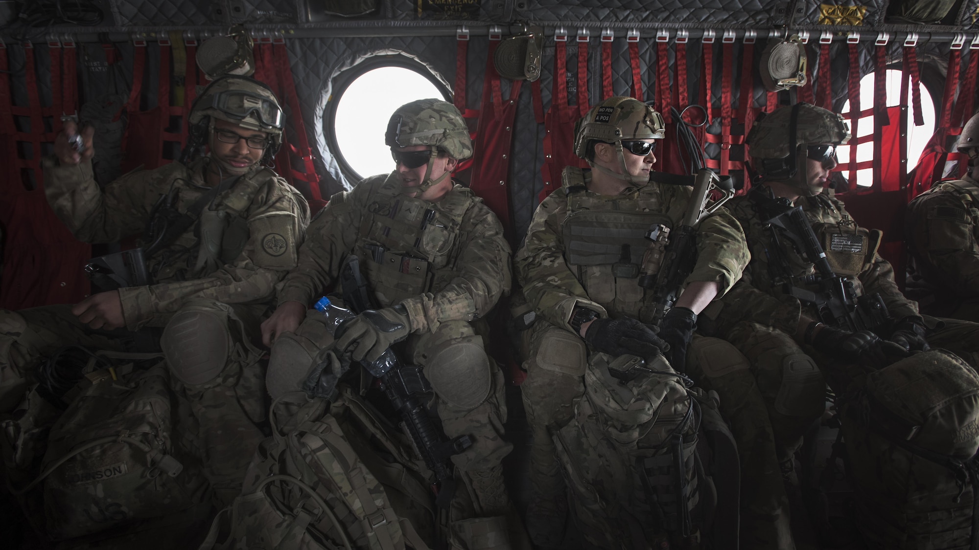 Members of Able Platoon, 1st Squadron, 3rd Cavalry Regiment, and Tech. Sgt. Jeremy Rarang, 817th Expeditionary Air Support Operations Squadron joint terminal attack controller, fly in a CH-47 Chinook after training Nov. 21, 2016 at Forward Operating Base Dahlke, Afghanistan. JTACs direct aircraft for use during close air support and offensive operations from a forward position. (U.S. Air Force photo by Staff Sgt. Katherine Spessa)