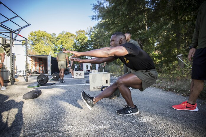 A Force Fitness Instructor Trainer demonstrates the proper execution of a pistol squat. While attending the course, students will learn how to perform and coach a variety of exercises and movements.