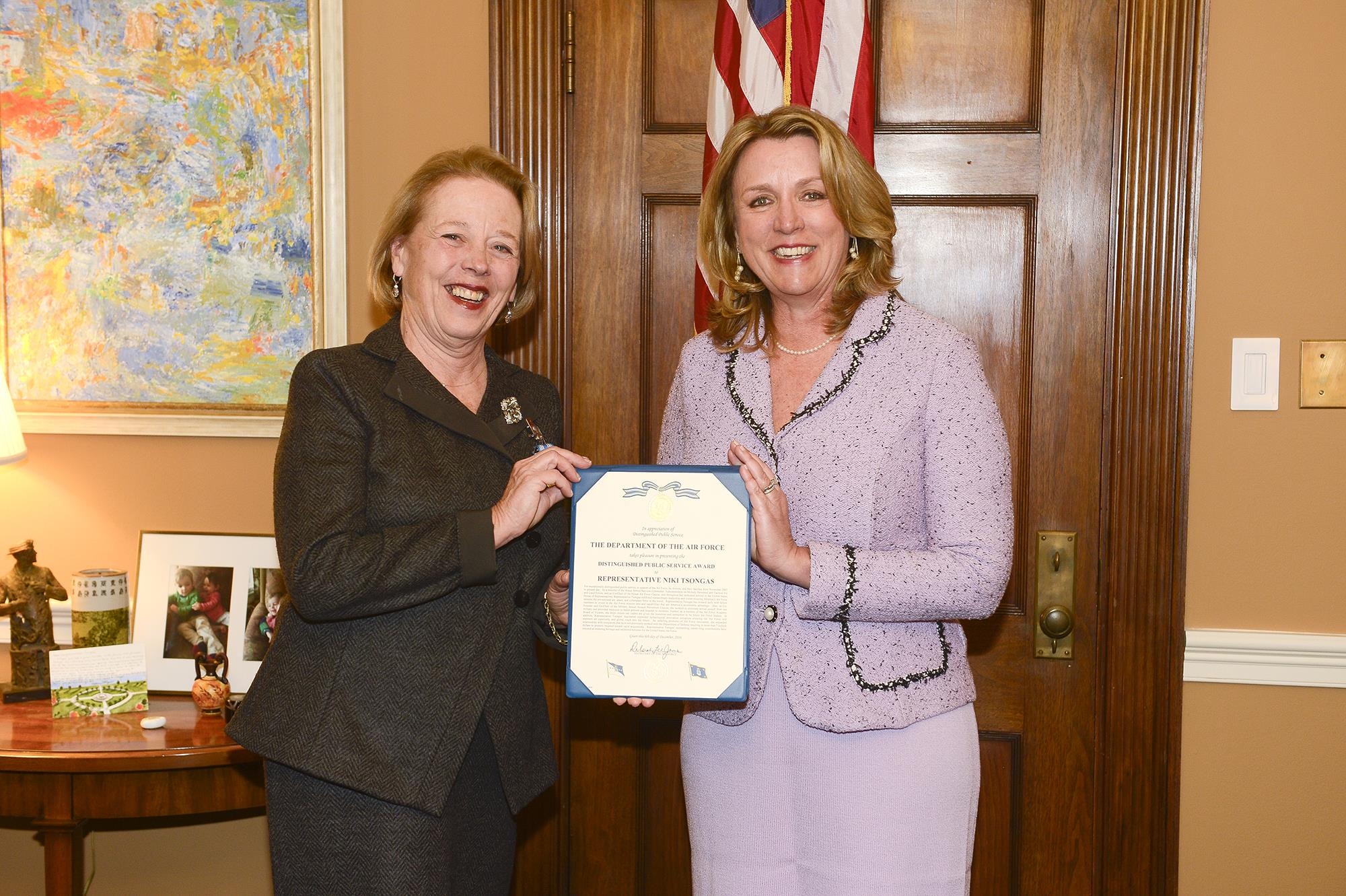 Air Force Secretary Deborah Lee James presents the Distinguished Public Service Award to U.S. Rep. Nikki Tsongas, (D-MA), in Washington, D.C. Dec 6, 2016. Tsongas, a member of the Air Force Academy Board of Visitors, helped ensure cadets were given the resources and instruction to be future Air Force leaders. Her legislation expanded technological innovation initiatives, ensuring the Air Force maintains air superiority and global reach into the future. (U.S. Air Force photo/Andy Morataya)