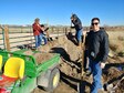 (From left to right) Senior Master Sgt. Ruth Altman-Burnett, Staff Sgt. Gomez, Alba Palacio, Carri Boswell and Staff Sgt. Nikolaus Rouse spread fresh dirt on an out door riding coral at the Pikes Peak Therapeutic Riding Center, Nov. 30. The HQ RIO Detachment 3 staff spent the afternoon performing a variety of maintenance and housekeeping projects for the local non-profit.