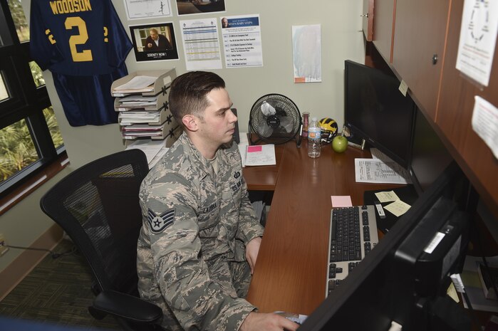 U.S. Staff Sgt. Gabriel Lazurka, financial services supervisor at the 628th Comptroller Squadron, works on his computer Nov. 30, 2016, at Joint Base Charleston, South Carolina. Lazurka was accepted into the Commissioned Officer Training program for healthcare. COT is a five-week program designed to transition Airmen and civilians into the U.S. Air Force commissioned officers corps. 