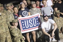 Marine Gen. Joseph F. Dunford, Jr., chairman of the Joint Chiefs of Staff, and Command Sgt. Maj. John W. Troxell, Senior Enlisted Advisor to the Chairman of the Joint Chiefs of Staff, meet with deployed service members at Al-Udeid Air Base, Qatar, Dec. 6, 2016. Dunford, along with USO entertainers, visited service members who are deployed from home during the holidays at various locations across the globe. This year’s entertainers included actors Chris Evans, actress Scarlett Johansson, NBA Legend Ray Allen, 4-time Olympic Medalist Maya DiRado, Country Music Singer Craig Campbell, and mentalist Jim Karol. (DoD photo by Navy Petty Officer 2nd Class Dominique A. Pineiro)