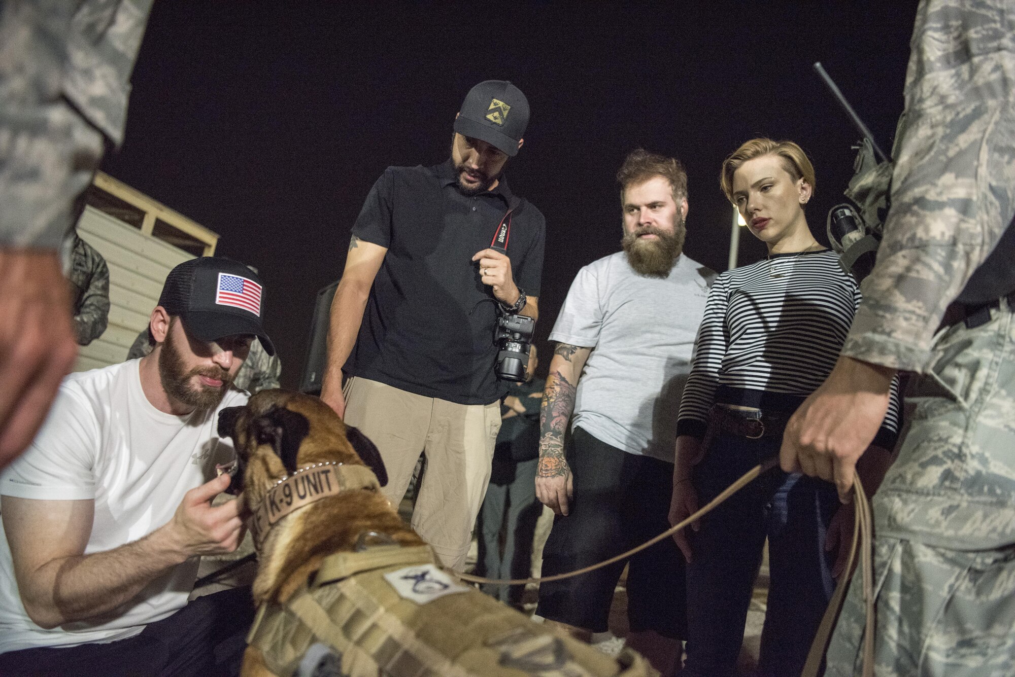 Marine Gen. Joseph F. Dunford, Jr., chairman of the Joint Chiefs of Staff, and Command Sgt. Maj. John W. Troxell, Senior Enlisted Advisor to the Chairman of the Joint Chiefs of Staff, meet with deployed service members at Al-Udeid Air Base, Qatar, Dec. 6, 2016. Dunford, along with USO entertainers, visited service members who are deployed from home during the holidays at various locations across the globe. This year’s entertainers included actors Chris Evans, actress Scarlett Johansson, NBA Legend Ray Allen, 4-time Olympic Medalist Maya DiRado, Country Music Singer Craig Campbell, and mentalist Jim Karol. (DoD photo by Navy Petty Officer 2nd Class Dominique A. Pineiro/Released)