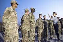 Scarlett Johansson meets with service members during a troop engagement at Al-Udeid Air Base, Qatar, Dec. 6, 2016. Marine Gen. Joseph F. Dunford, Jr., chairman of the Joint Chiefs of Staff, along with USO entertainers, visited service members who are deployed from home during the holidays at various locations across the globe.  This year’s entertainers included actors Chris Evans, actress Scarlett Johansson, NBA Legend Ray Allen, 4-time Olympic Medalist Maya DiRado, Country Music Singer Craig Campbell, and mentalist Jim Karol. (DoD photo by Navy Petty Officer 2nd Class Dominique A. Pineiro)