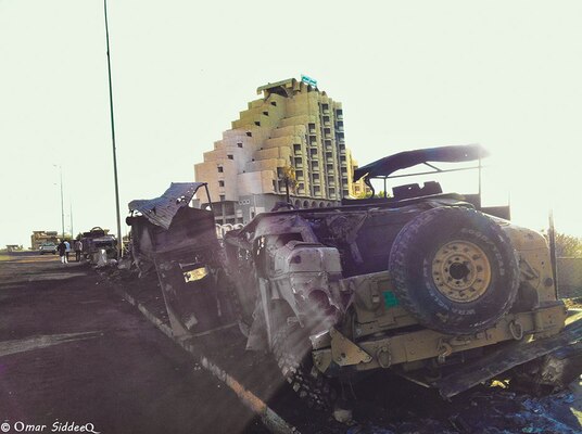 Humvee down after Islamic State of Iraq and the Levant attack in Mosul, Iraq 2014-06-14