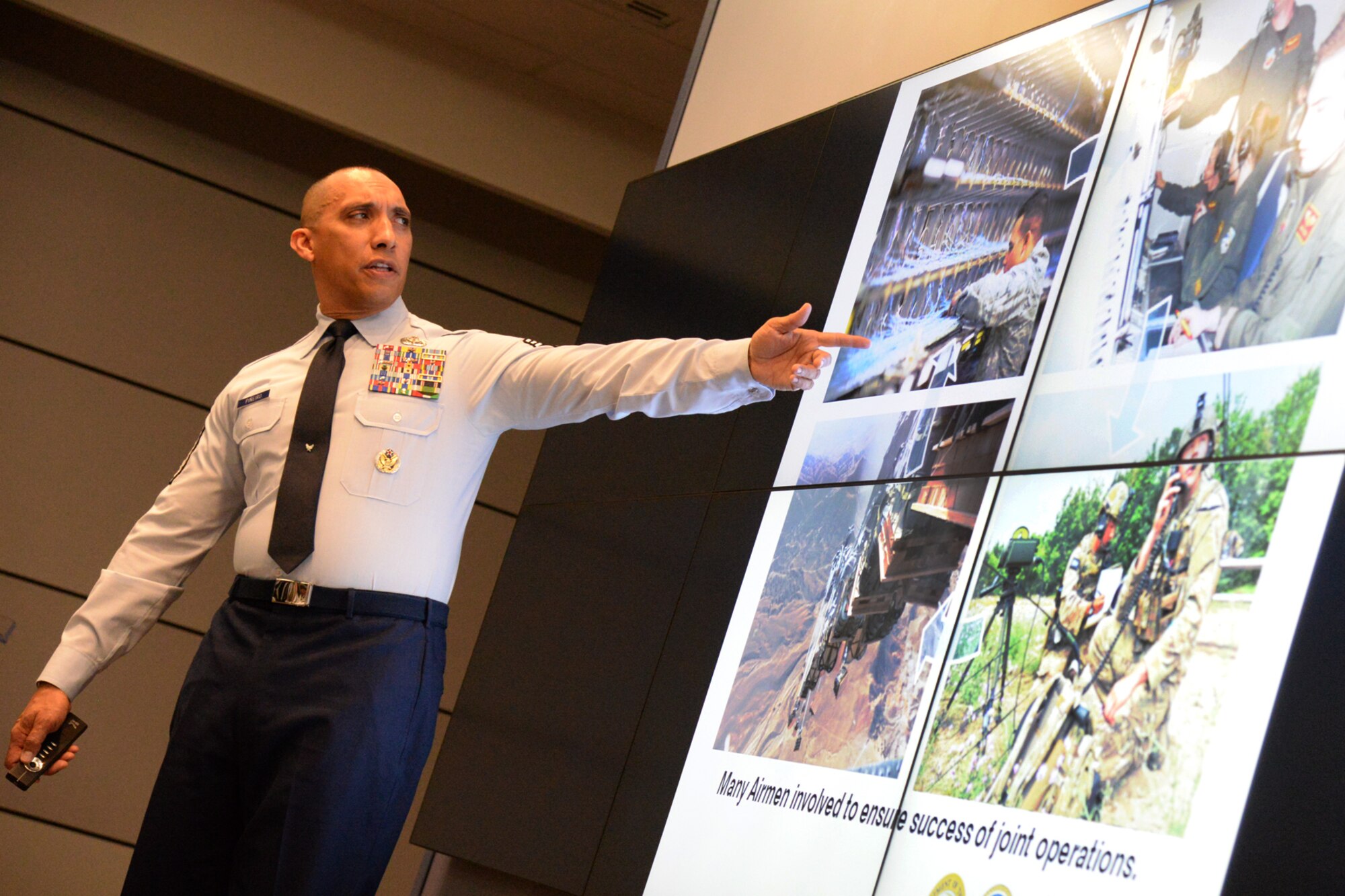 Chief Master Sgt. Manny Pineiro, Air Force District of Washington First Sergeant, briefs the Air Force’s impact on the joint mission during the National Capital Region Joint Professional Development Seminar in Washington D.C. on Nov. 30, 2016. The seminar was held at the National Defense University on Ft. McNair and helps NCOs develop skills to prepare them for challenges they may face filling joint mission requirements. (U.S. Air Force photo/Tech. Sgt. Matt Davis)
