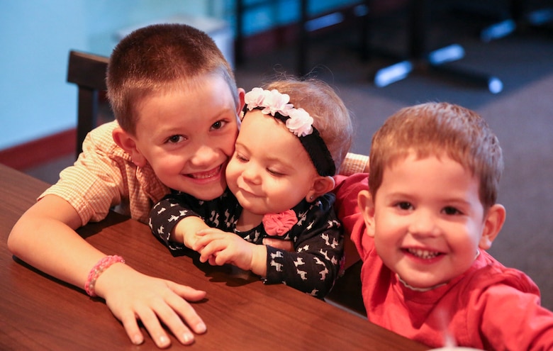 Sgt. Robert Newborg’s children play after receiving the Military Family of the Quarter award in Havelock, N.C., Oct. 25, 2016. The award is given to the military family that has most positively impacted the local community over the past quarter. The Newborg’s donated and volunteered time and energy to the community by working with organizations such as the Knights of Columbus and a local elementary school. Newborg is a cryptologic equipment instructor at the Center of Naval Aviation Technical Training aboard Marine Corps Air Station Cherry Point, N.C. (U.S. Marine Corps photo by Lance Cpl. Cody Lemons/Released)