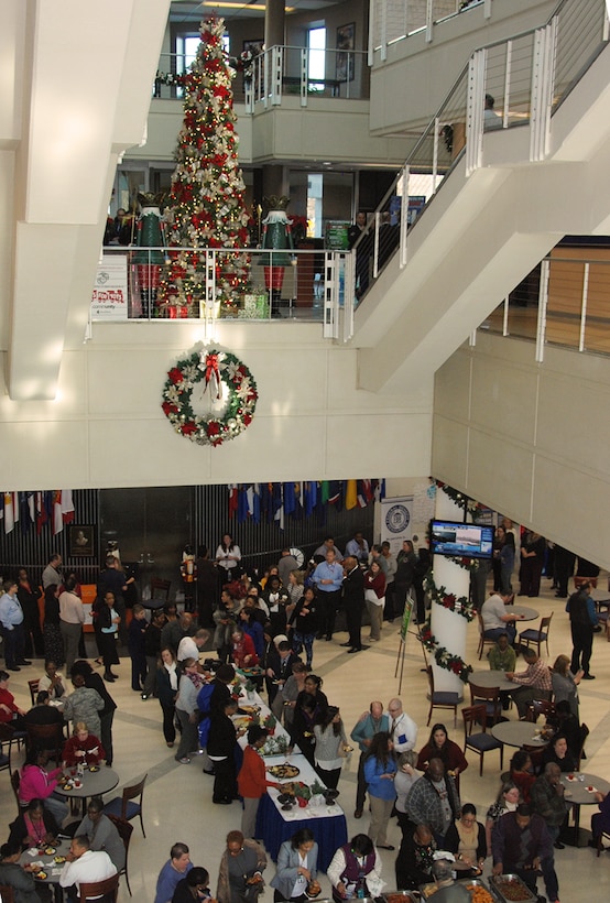 The annual McNamara Headquarters Complex tree lighting ceremony and holiday social brings together employees from the Defense Logistics Agency, Defense Threat Reduction Agency, Defense Contract Audit Agency and Defense Technical Information Center. 