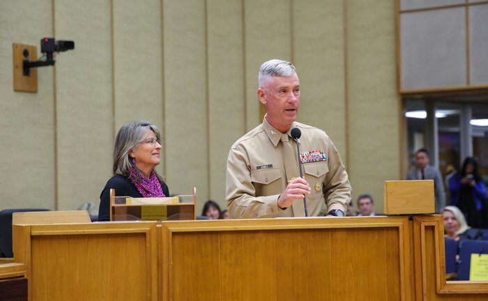 Colonel Robert W. Jones, assistant chief of staff G-3, speaks during a San Diego City Council meeting in Downtown San Diego, Dec. 6. As part of the meeting, Dec. 6th was declared Marine Corps Recruit Depot Centennial Day in San Diego.