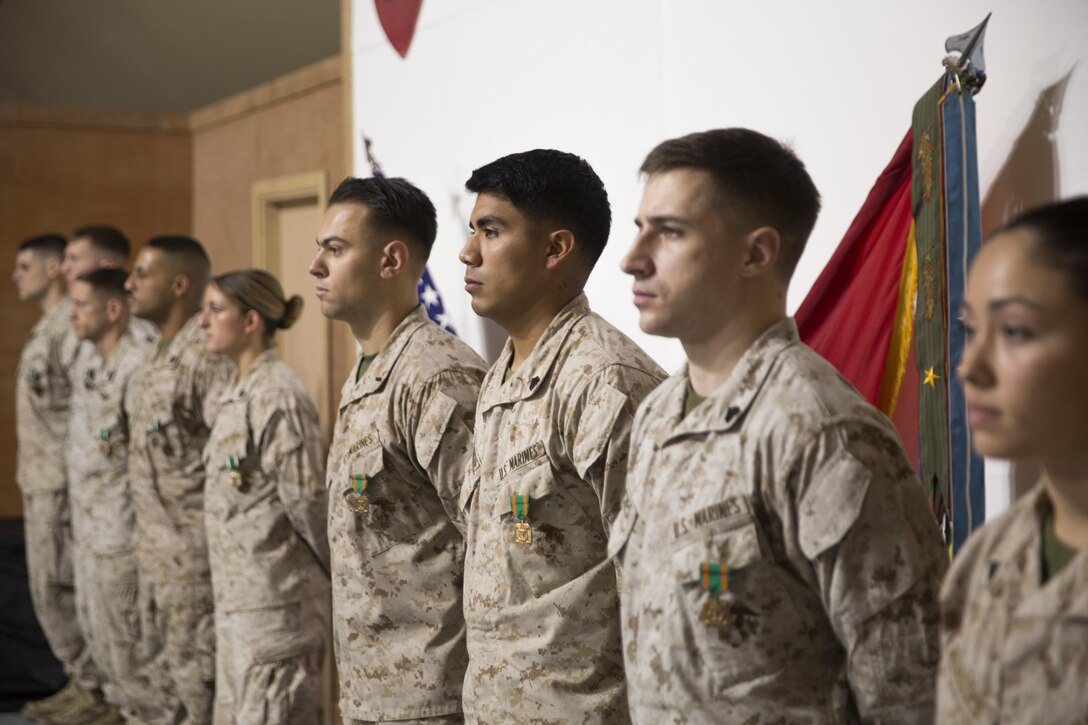 Marines with Special Purpose Marine Air-Ground Task Force – Crisis Response – Central Command were awarded during a town hall brief while forward deployed Dec. 4, 2016. The Marines have been conducting various missions in support of Operation Inherent Resolve, to include the building of intelligence support packages leading to kinetic airstrikes against Islamic State of Iraq and the Levant targets; upgrading communications capabilities between SPMAGTF and special operating forces in the AOR and conducting theater security cooperation training exercises with partner nations. SPMAGTF-CR-CC is a self-sustaining expeditionary unit, designed to provide a broad range of crisis response capabilities throughout the Central Command area of responsibility, using organic aviation, logistical and ground combat assets, to include embassy reinforcement and tactical recovery of aircraft and personnel.