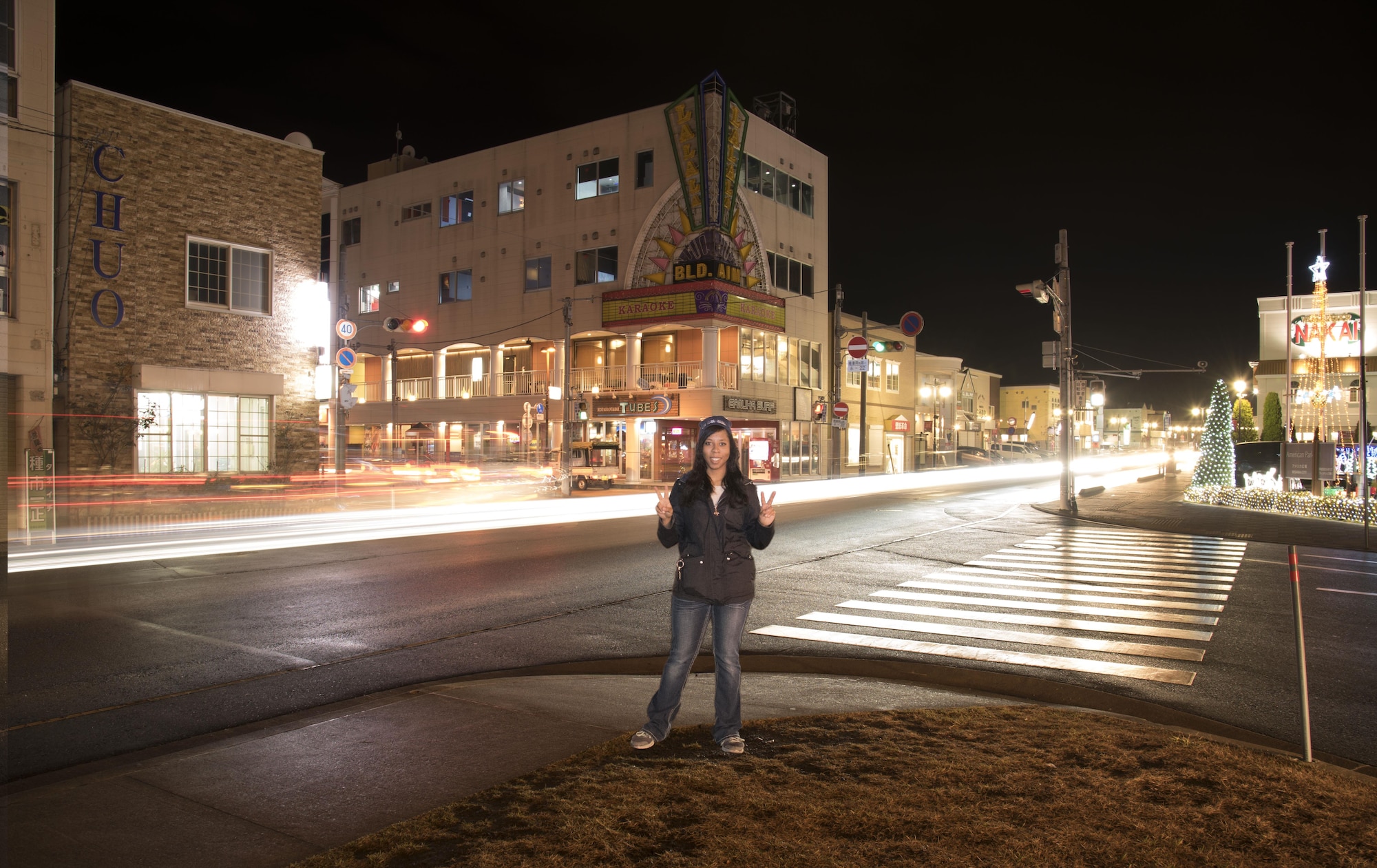 U.S. Air Force Airman 1st Class Sadie Colbert, a 35th Fighter Wing public affairs photojournalist, poses for a photo in Misawa City, Japan, Dec. 1, 2016. Getting out and exploring provides opportunities to meet Japanese locals and discover the various festivals, activities and food joints, making life an adventure during the holiday season. (U.S. Air Force photo by Senior Airman Brittany Chase)