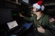 Capt. Darryl Lawlor, 36th Airlift Squadron C-130 Hercules navigator, operates navigation instruments during Operation Christmas Drop over remote Micronesian islands, Dec. 5, 2016. Operation Christmas Drop is a training mission which helps the 374th Airlift Wing, Yokota AB, Japan, along with Japan Air Self-Defense Force and Royal Australian Air Force, to maintain and develop combat readiness through sustainable aircraft generation/recovery while practicing low-cost, low-altitude airdrops. (U.S. Air Force (U.S. Air Force photo by Senior Airman Delano Scott/Released)
