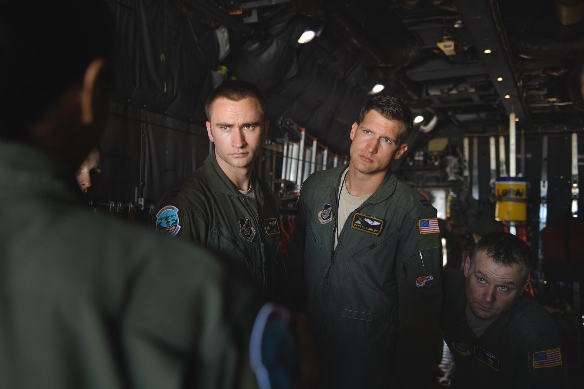 Airman 1st Class Alejandra Vargas, 36th Airlift Squadron C-130 Hercules loadmaster, briefs crewmembers during Operation Christmas Drop 2016 at Andersen Air Force Base, Guam, Dec. 6, 2016. This year marks 65 years of Operation Christmas Drop which provides joint airlift training opportunities for both peace and wartime efforts. (U.S. Air Force photo by Senior Airman Delano Scott/Released)