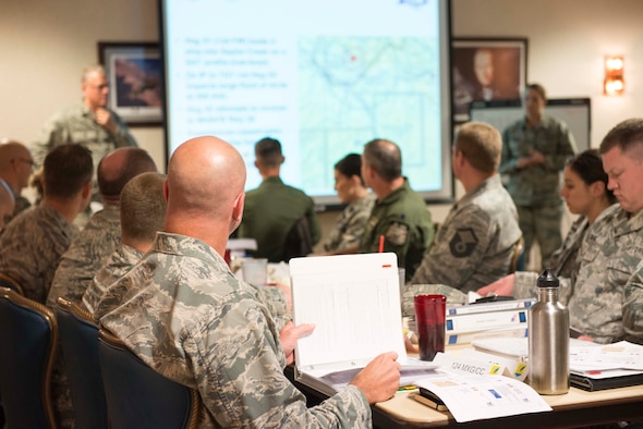 The 366th and 124th Fighter Wings walk through emergency checklists in a response exercise at Mountain Home Air Force Base, Nov. 30, 2016. The two wings collaborated on updating and improving checklists, while training for a mass accident response. (U.S. Air Force photo by 2nd Lt. Kevyn Stinett/Released)