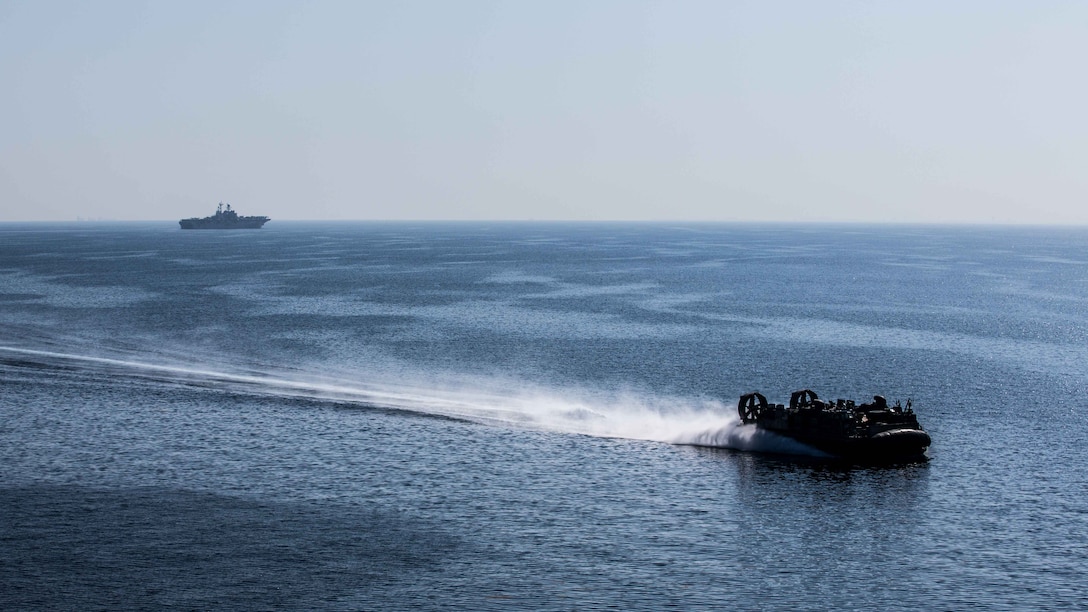 U.S. 5TH FLEET AREA OF OPERATIONS (Dec. 6, 2016) A landing craft air cushion with the Makin Island Amphibious Ready Group (MKI ARG) moves through the Gulf of Aden during the initial landing phases of Exercise Alligator Dagger, Dec. 6, 2016. The MKI ARG and 11th Marine Expeditionary Unit will conduct amphibious operation rehearsals to maintain a high level of readiness in the event there is a need for an immediate response to a crisis. The exercise will focus on: amphibious assaults; helo-borne raids; visit, board, search and seizure (VBSS) operations; air strikes; defense of the amphibious task force; mechanized movements with tanks and light armored vehicles; tactical recovery of aircraft and personnel; ground reconnaissance; and quick reaction force and casualty evacuation rehearsals. (U.S. Marine Corps photo by Cpl. Devan K. Gowans)