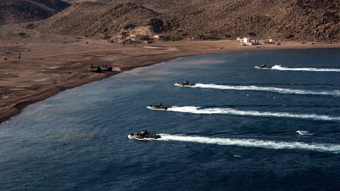 U.S. 5TH FLEET AREA OF OPERATIONS (Dec. 6, 2016) Amphibious assault vehicles with the 11th Marine Expeditionary Unit (MEU) prepare to land during the initial landing phases of Exercise Alligator Dagger, Dec. 6, 2016. The exercise involves all three ships of the Makin Island Amphibious Ready Group and enables the Marines and Sailors of the 11th MEU to conduct the comprehensive amphibious operations that keep their skills ready for crisis response and contingency operations throughout the Central Command area of responsibility. (U.S. Marine Corps photo by Cpl. Devan K. Gowans)