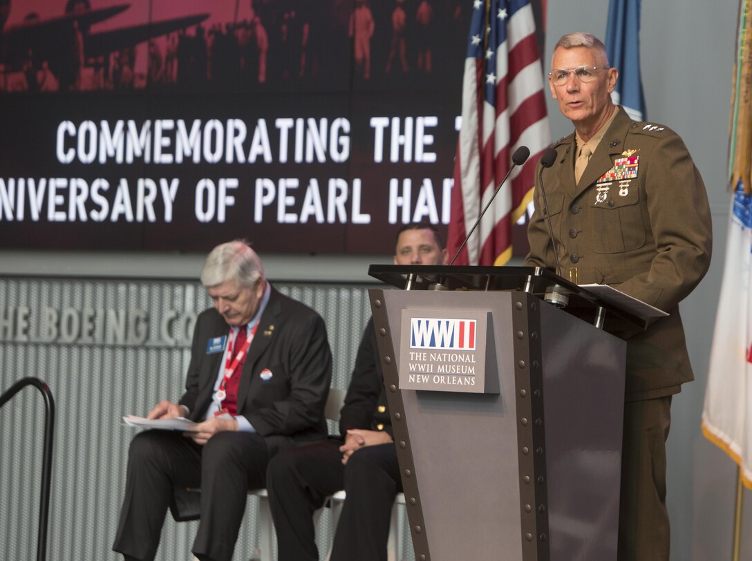 Lt. Gen. Rex C. McMillian, commander of Marine Forces Reserve and Marine Forces North, speaks during a commemorative ceremony at the National World War II Museum, Dec. 7, 2016, for the 75th anniversary of the attack on Pearl Harbor. The event honored the service members who were present during the fateful attack on Dec. 7, 1941. During World War II, by September of 1945, Reserve Marines made up 70 percent of total wartime Marine Corps personnel. For information on the history and heritage of the Marine Corps Reserve as well as current Marine stories and upcoming Centennial events, please visit www.marines.mil/usmcr100. (U.S. Marine Corps photo by Sgt. Ian Leones)