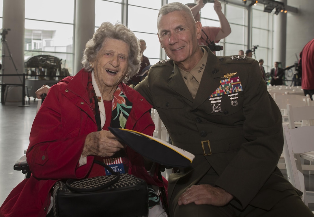 Lt. Gen. Rex C. McMillian, commander of Marine Forces Reserve and Marine Forces North, and Angie Engel, whose husband served as a Navy pilot at Pearl Harbor, pose for a photo during a commemorative ceremony at the National World War II Museum, Dec. 7, 2016, for the 75th anniversary of the attack on Pearl Harbor. The event honored the service members who were present during the fateful attack on Dec. 7, 1941. During World War II, by September of 1945, Reserve Marines made up 70 percent of total wartime Marine Corps personnel. For information on the history and heritage of the Marine Corps Reserve as well as current Marine stories and upcoming Centennial events, please visit www.marines.mil/usmcr100. (U.S. Marine Corps photo by Sgt. Ian Leones)