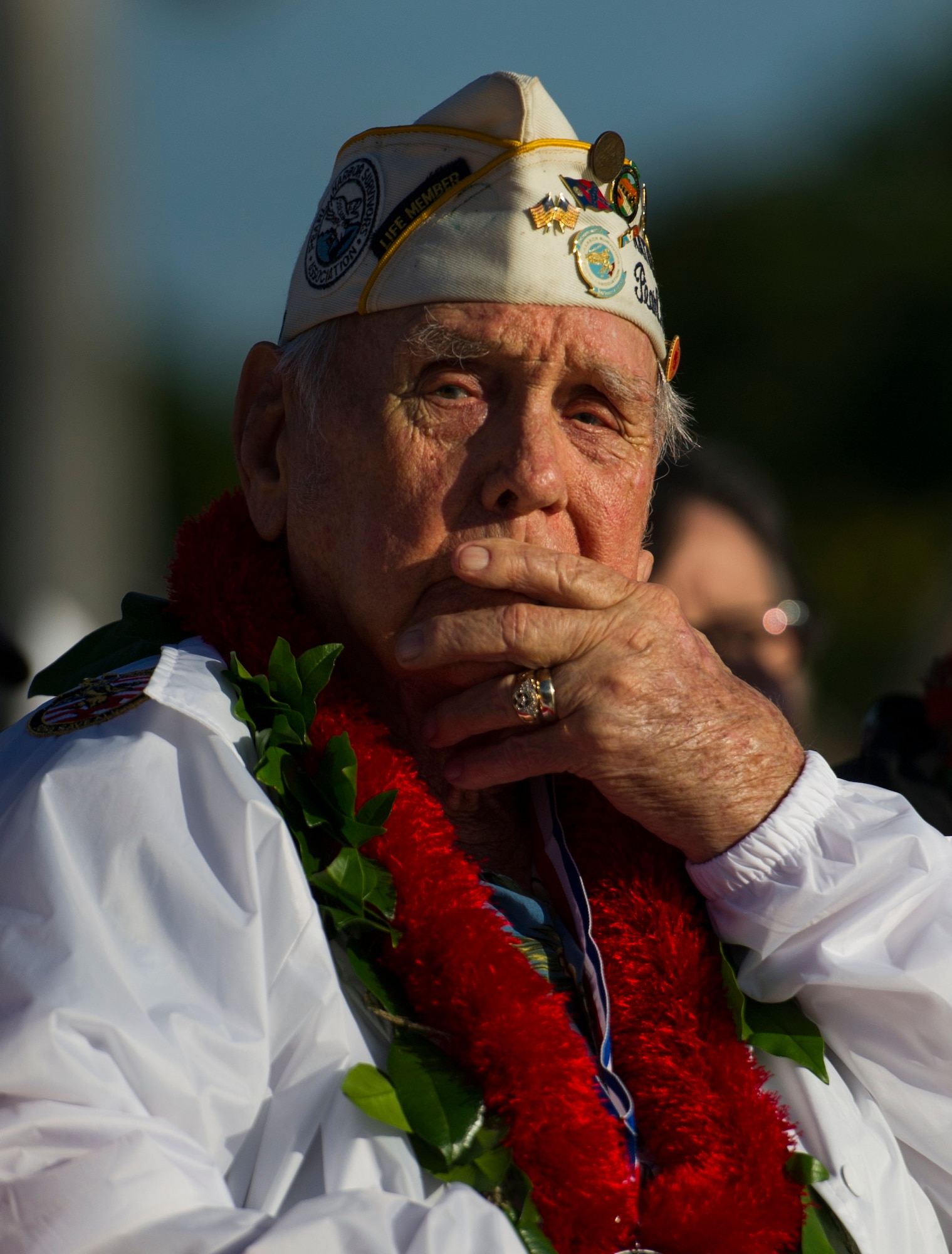 Former U.S. Air Force Staff Sgt. Durward Swanson reflects during the 75th Commemoration of the Dec. 7, 1941 attack on Hickam Field ceremony Dec. 7, 2016, at Joint Base Pearl Harbor-Hickam, Hawaii. Swanson was assigned to Hickam Field as a security forces guard. After the attack, he served as a B-17 Flying Fortress crew chief. During the Battle of Midway, his aircraft was hit and crash-landed in the water. Seven of the 10-man crew were killed. Swanson received severe injuries and spent nine months in the hospital. He received the Distinguished Flying Cross, a Purple Heart, and an honorable discharge. (U.S. Air Force photo by Tech. Sgt. Nathan Allen)