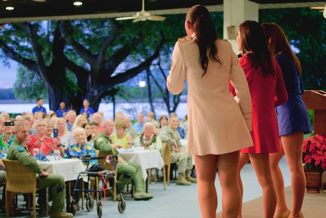 The USO Show Troupe performs for dinner guests during a Dec. 7 rememberance dinner, Dec. 6, 2016, Joint Base Pearl Harbor-Hickam, Hawaii. The dinner was part of a week long celebration commemorating the 75th anniversary of the attacks on Pearl Harbor, Hickam Field and Oahu. The U.S. military and the State of Hawaii are hosting a series of remembrance events to honor the Pacific Theater's veterans. (U.S. Air Force photo by Tech. Sgt. James Stewart/Released)