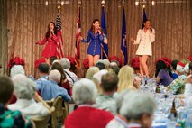 The USO Show Troupe performs for dinner guests during a Dec. 7 rememberance dinner, Dec. 6, 2016, Joint Base Pearl Harbor-Hickam, Hawaii. The dinner was part of a week long celebration commemorating the 75th anniversary of the attacks on Pearl Harbor, Hickam Field and Oahu. The U.S. military and the State of Hawaii are hosting a series of remembrance events to honor the Pacific Theater's veterans. (U.S. Air Force photo by Tech. Sgt. James Stewart/Released)