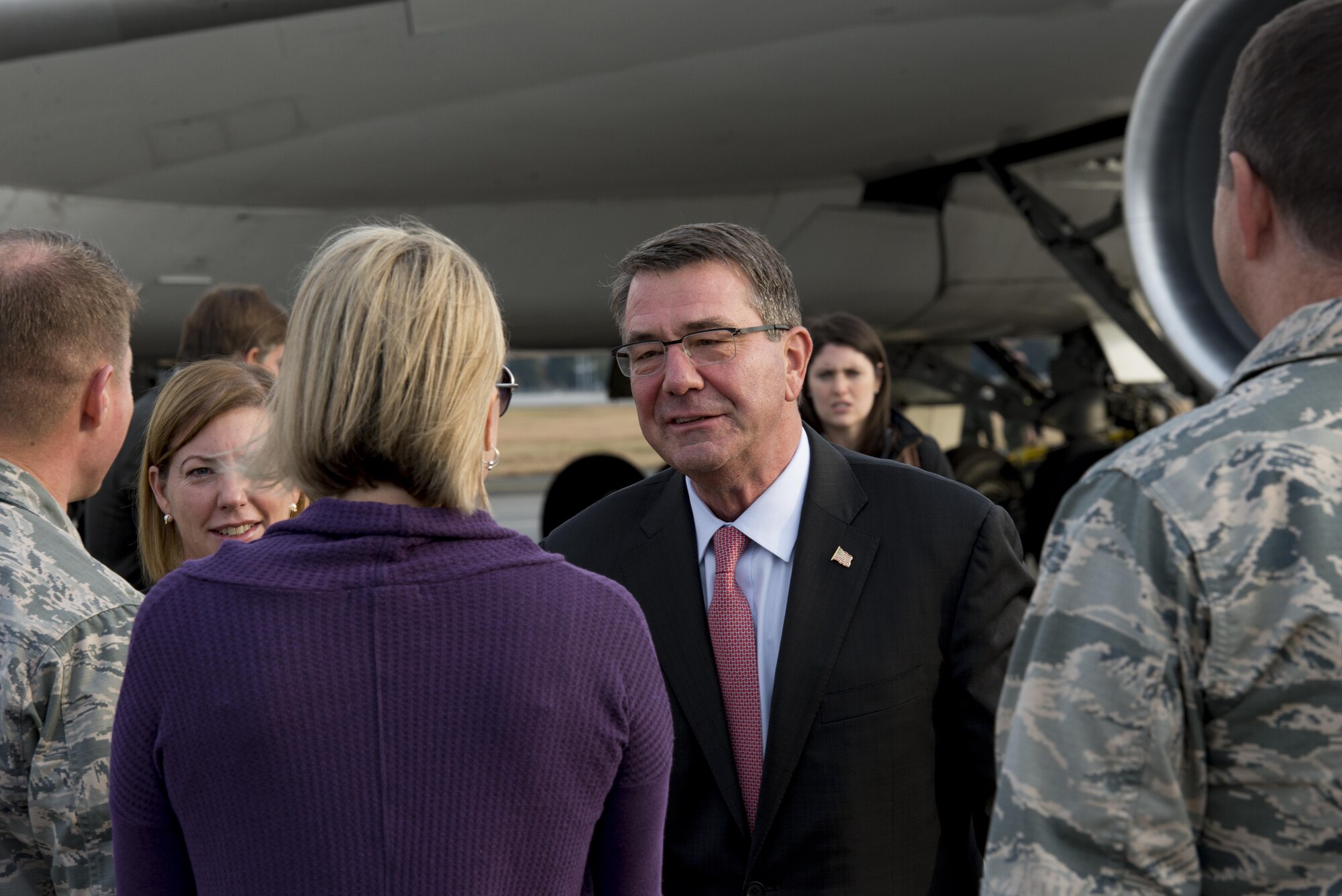 U.S. Secretary of Defense Ashton B. Carter shakes hands with members of the official greeting party Dec. 5, 2016 upon arrival to Yokota Air Base, Japan. Carter stopped at Yokota during his travel to U.S. military instillations across the world, with plans to thank deployed U.S. troops for their service over the holidays. (U.S. Air Force photo by Airman 1st Class Donald Hudson/Released)