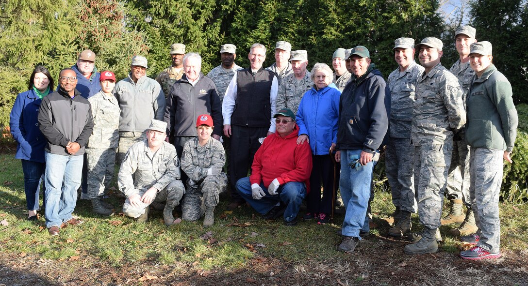 After hoisting nearly 100 Christmas trees bound for global distribution, area Pa. National Guard service members teamed with family members of the Bustard Tree Farm, state and local representatives take the time to pose for a group photo at the farm located in Lansdale, Pa., Dec. 2, 2016. Among the keynote speakers during the Trees for Troops program kickoff there, were State Rep. John Rafferty, Jr., 44th Pa. District (center left, black jacket) and Pa. Secretary of Agriculture, Russell Redding (black vest).  (U.S. Air National Guard photo by Master Sgt. Christopher Botzum)
