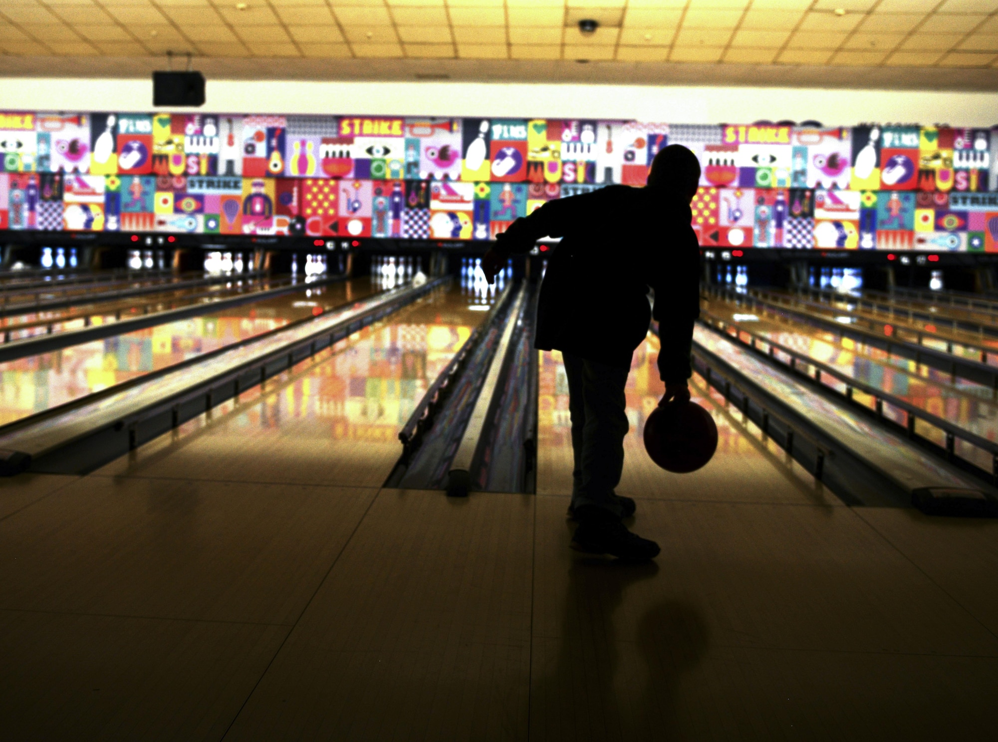 A Special Olympics participant bowls at Vogelweh Military Complex, Germany, Dec. 2, 2016. The Special Olympics event aimed to enhance the social skills and self-confidence of special needs children. (U.S. Air Force photo by Airman 1st Class Joshua Magbanua)