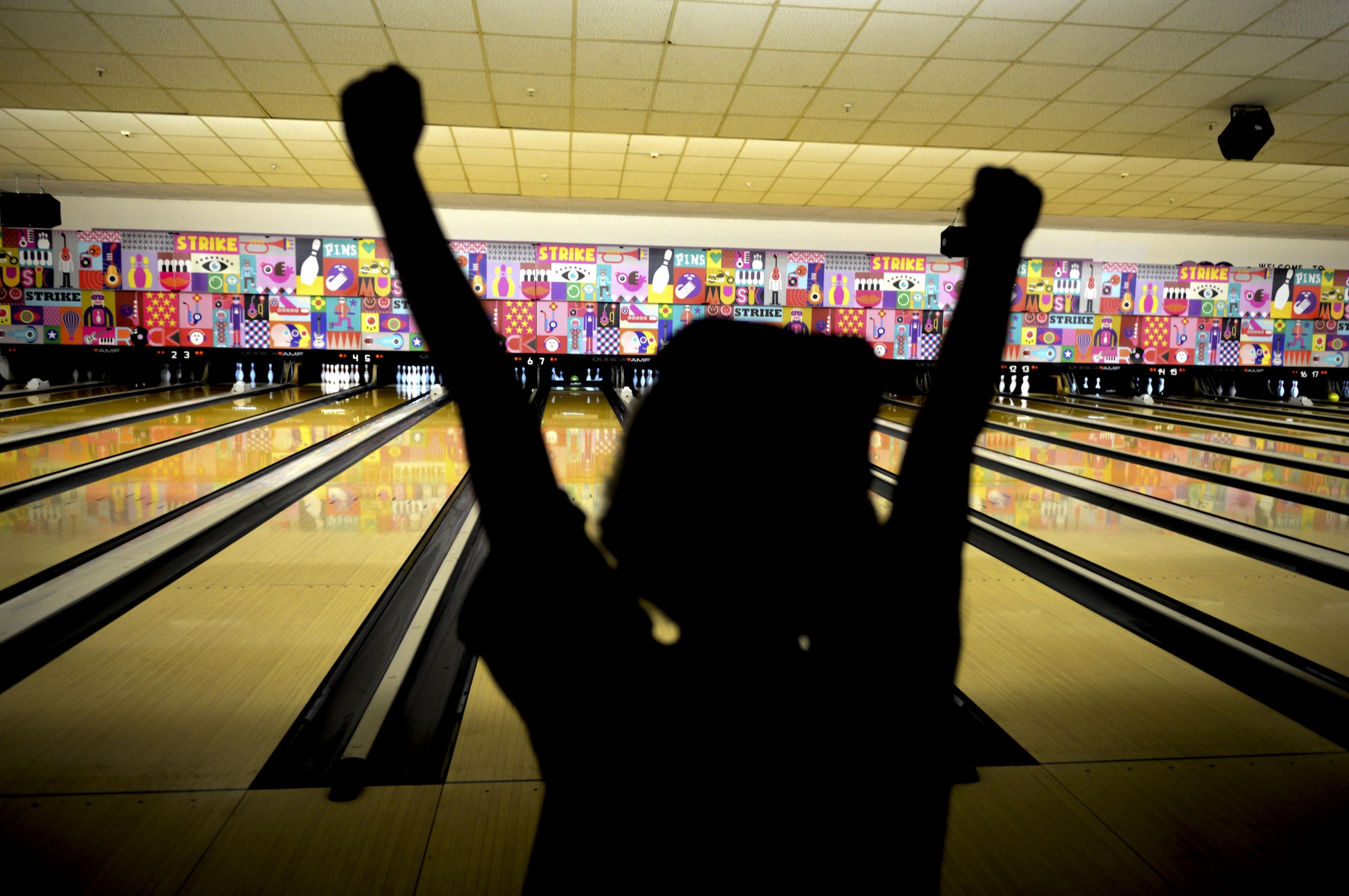 A Special Olympics’ participant cheers while bowling at Vogelweh Military Complex, Germany, Dec. 2, 2016. The event aimed to enhance self-confidence in children with special needs. (U.S. Air Force photo by Airman 1st Class Joshua Magbanua)