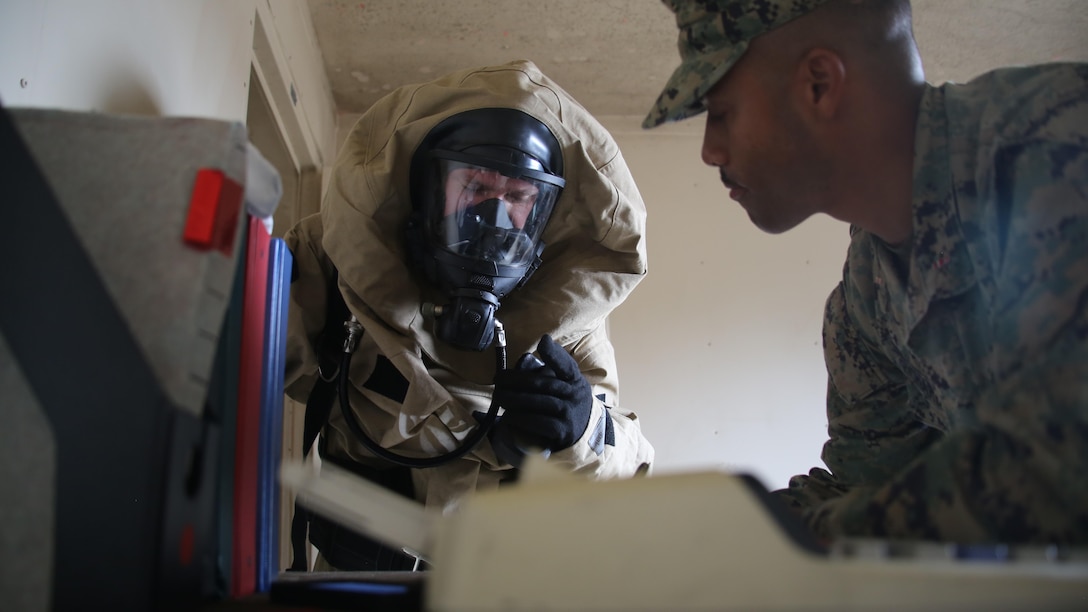A Marine recalls items in a room to an evaluator during a memory application event as part of a field exercise at Marine Corps Outlying Field Atlantic Nov. 30, 2016. Twenty-two Marines with Chemical, Biological, Radiological and Nuclear Defense, 2nd Marine Aircraft Wing, conducted a week-long annual training exercise that refreshed the defense specialists on the roots of their basic military occupational specialty training. The exercise included an assortment of stations and classes that tested the Marines physically and mentally. (U.S. Marine Corps photo by Lance Cpl. Mackenzie Gibson/Released)