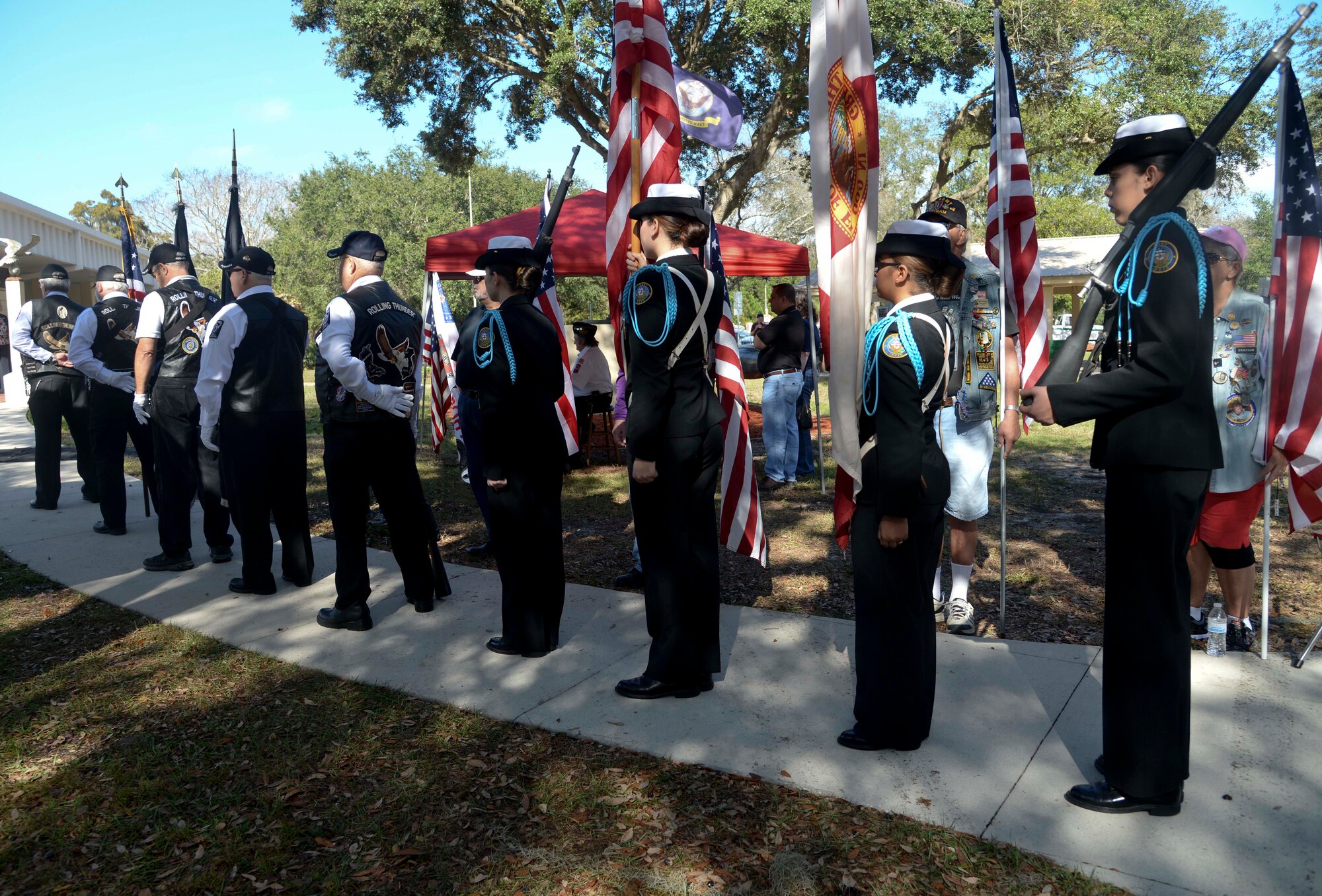 Members of the Rolling Thunder Florida Chapter 11, and the Riverview High School Navy Junior Reserve Officers’ Training Corps, prepare to present the colors during the Pearl Harbor Remembrance Day ceremony at Veterans Memorial Park in Tampa, Fla., Dec. 7, 2016. Service members, veterans, retirees and civilians gathered to commemorate the 75th anniversary with a ceremony themed “We Remember the Fallen.” (U.S. Air Force photo by Senior Airman Vernon L. Fowler Jr.)