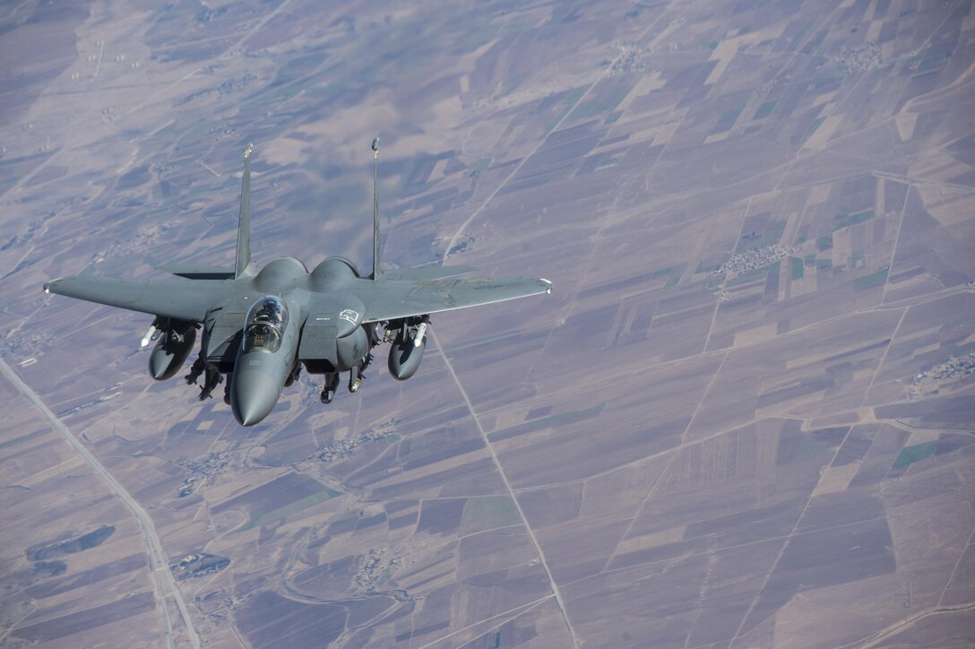 A U.S. Air Force F-15 Strike Eagle approaches a KC-135 Stratotanker in support of a Combined Joint Task Force - Operation Inherent Resolve mission over Iraq Dec. 7, 2016. The KC-135 provides aerial refueling capabilities for the CJTF as it supports the Iraqi Security Forces and the partnered forces in Syria as they work to liberate territory and people under the control of Da’esh. (U.S. Air Force photo by Staff Sgt. Matthew B. Fredericks)