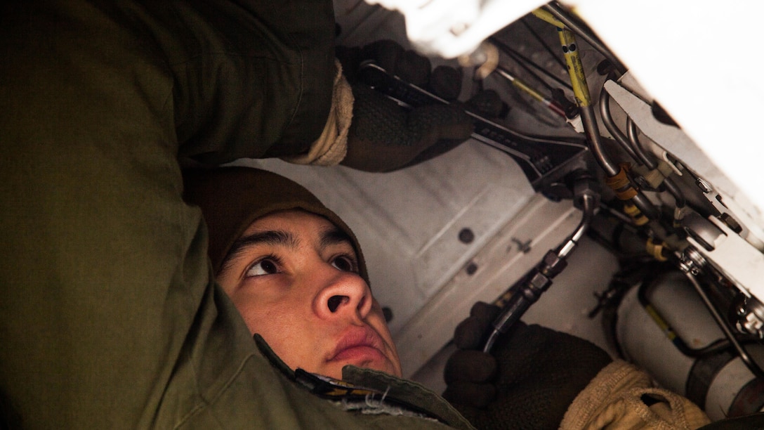 U.S. Marines with Marine Attack Squadron  542 conduct routine inspections and maintenance on the AV-8B Harriers during the Aviation Training Relocation Program at Chitose Air Base, Japan, Dec. 7, 2016. VMA-542 is conducting training with their harriers at Chitose Air Base in an effort to increase operational readiness between the U.S. Marine Corps and the Japan Air Self-Defense Force, improve interoperability and reduce noise concerns of aviation training on local communities by disseminating training locations throughout Japan. 