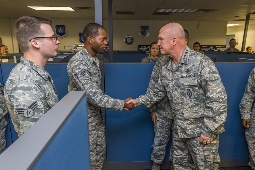 Gen. John Raymond, commander of Air Force Space Command, meets several cyber operators from the 690th Network Support Squadron Dec. 5, 2016 at Joint Base San Antonio-Lackland. (U.S. Air Force photo/Lt. Col. Cade Sonnichsen)