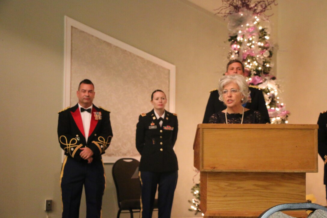 Rainelle, W.Va., Mayor Andrea “Andy” Pendleton speaks to the Soldiers, Families and friends of the 321st Ordnance Battalion at the unit Dining Out in Daniels, W. Va., Dec. 3, 2016, about the achievements of the 811th Ordnance Company while providing rescue operations, route clearance, and shelter for over 250 members of the local community of Rainelle, W.Va. during historic flooding of 24 through 27 June, 2016.