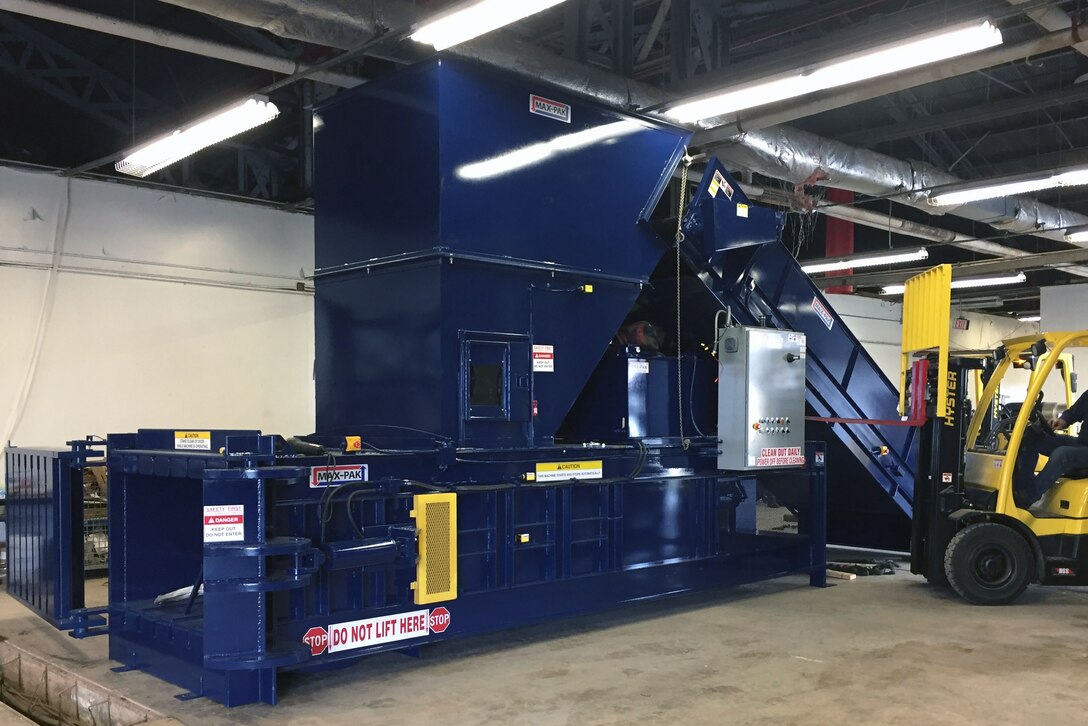 Recycled items are sorted and compacted by a new $96,000 baler, which Marilis Porter, solid waste and recycling manager, expects to pay for itself by the end of the year.