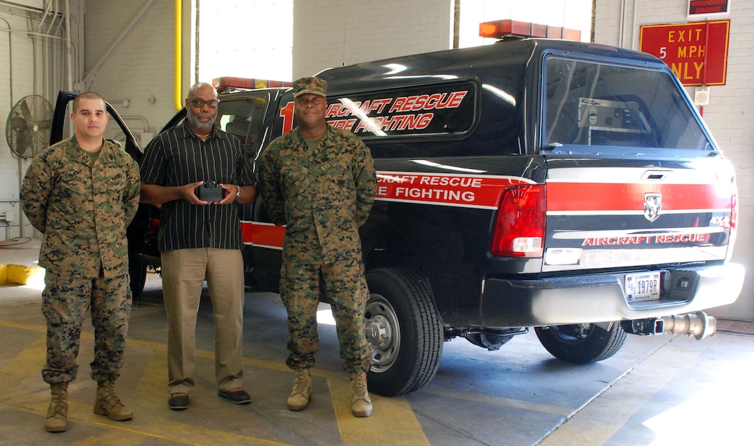 Sgt. Carlos Lopezcolon; Barkin McLemore, head, Transportation Branch; and Master Gunnery Sgt. Steve Mayhue lead the effort to instal DriveCam in passenger-carrying vehicles aboard MCB Quantico. The devices, called for under Executive Order 13693, will capture information on vehicle speed, location and emissions data.