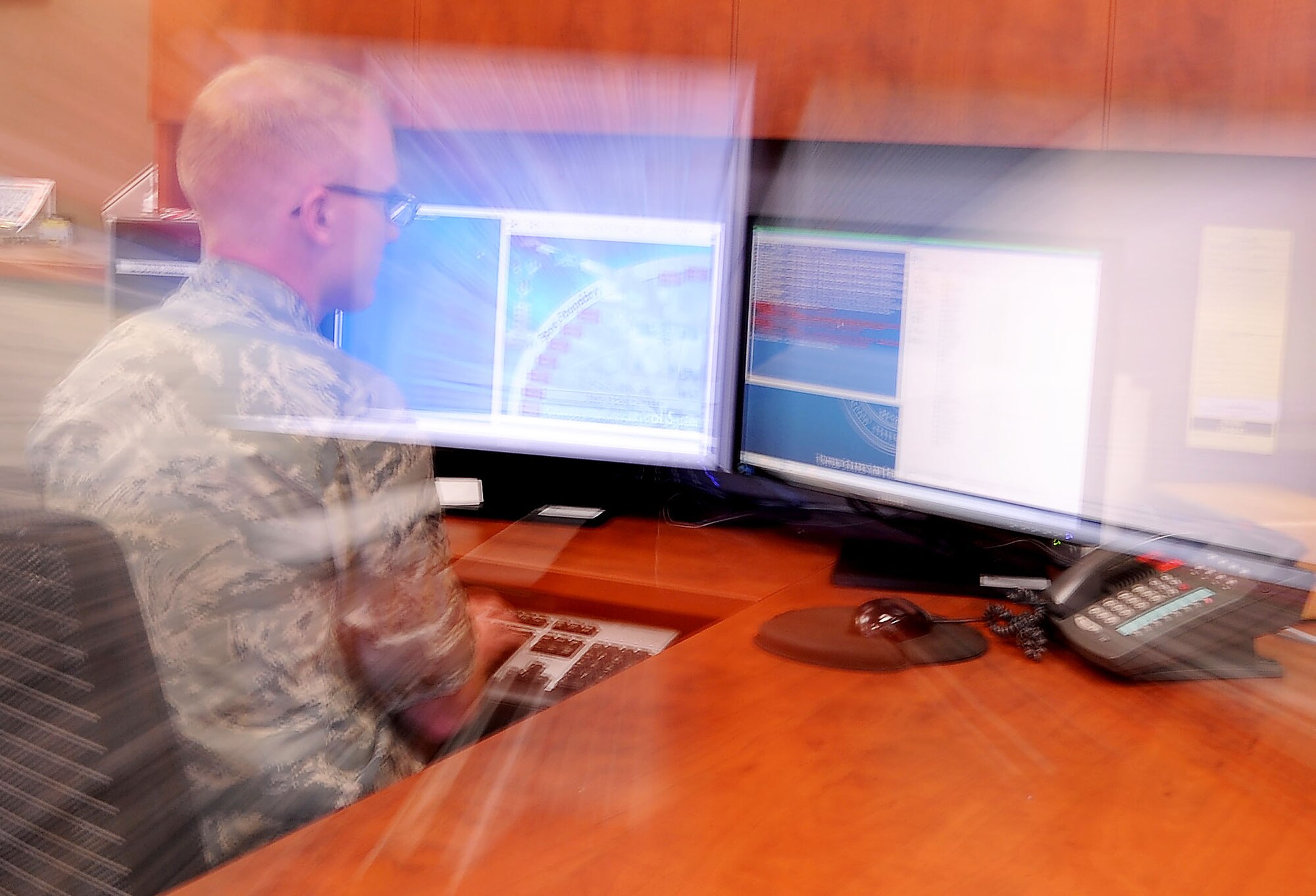 PETERSON AIR FORCE BASE, Colo. – Senior Airman Ryan Carney-Mogan, 960th Network Operations Squadron, cyber systems operator and directory services technician, simulates back end network operations on Nov. 5, 2016 here. The Directory Services section manages all users and computers for the entire Air Force Network. The 960th NOS is the only cyberspace operations group in the Air Force Reserve Command. (U.S. Air Force graphic/Staff Sgt. Amber Sorsek)