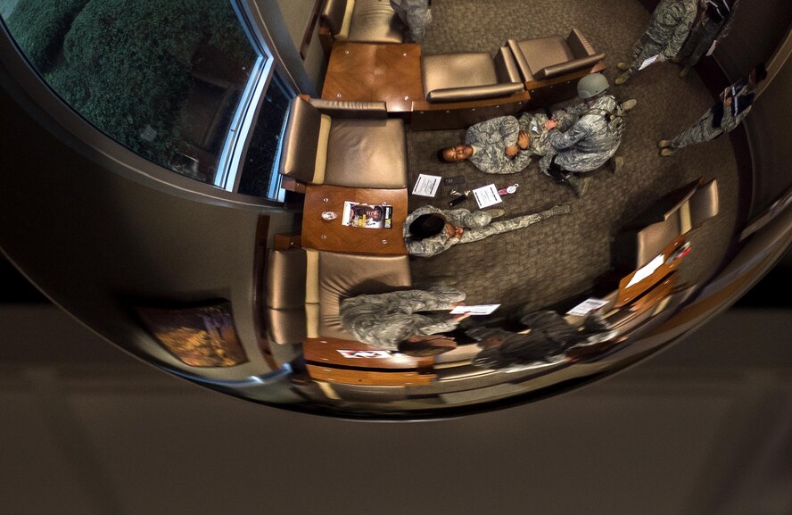 Staff Sgt. Seth Ewing, 2nd Security Forces Squadron patrolman, performs self-aid buddy-care to a simulated victim during an active shooter exercise on Barksdale Air Force Base, La., Nov. 29, 2016. After neutralizing the shooter and other security forces members searched the rest of the medical building for other potential threats before tending to victims. (U.S. Air Force photo/Senior Airman Damon Kasberg)