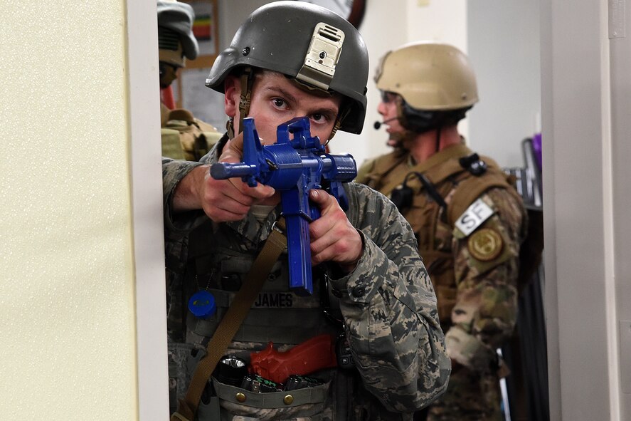 MALMSTROM AIR FORCE BASE, Mont. – Airman 1st Class Antonio James, a member of 341st Missile Security Forces Squadron, participates in an active shooter scenario at the base clinic on Malmstrom Air Force Base, October 27, 2016.  The purpose of these drills is to ensure security forces know how to handle unknown threats during an attack.  (U.S. Air Force photo/Senior Airman Jaeda Tookes)