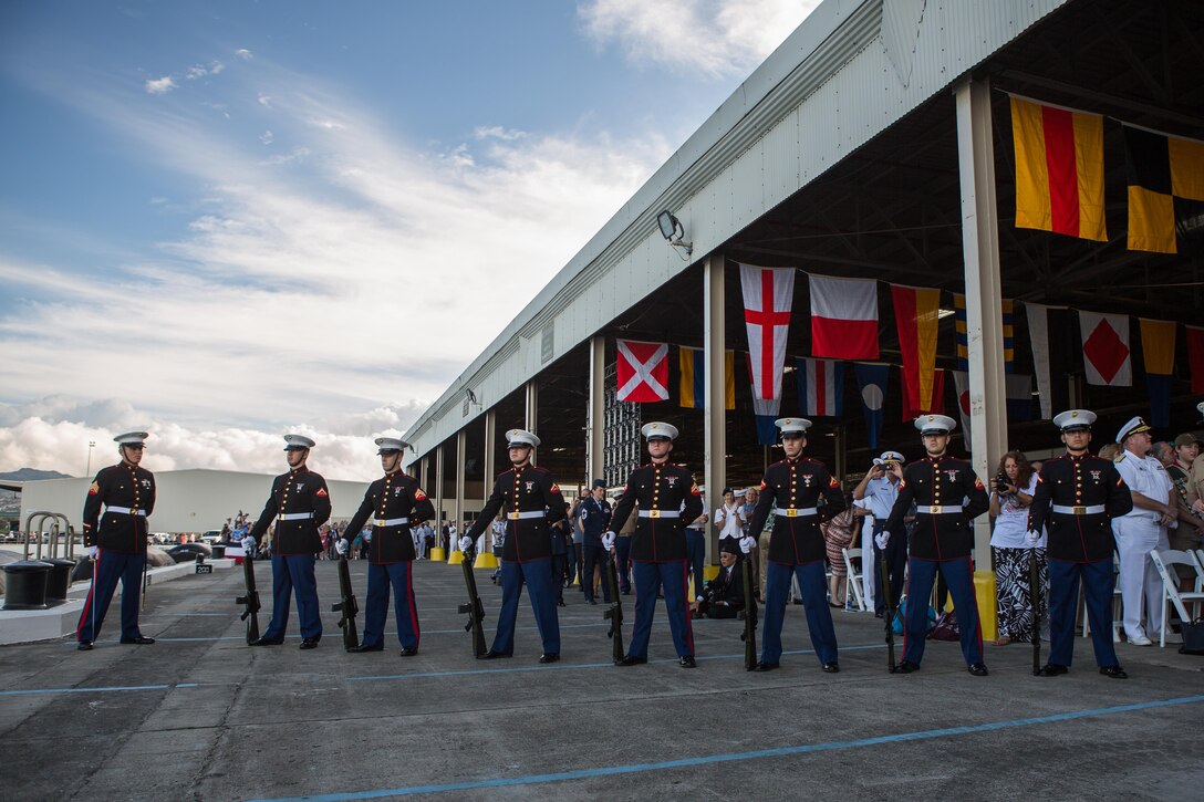 U.S. Marines with Marine Aircraft Group 24 stand at parade rest during the 75th Anniversary National Pearl Harbor Remembrance Day Commemoration Dec. 7, 2016 at Joint Base Pearl Harbor-Hickam, Hawaii. Dec. 7, 2016 marks the 75th anniversary of the attack on Pearl Harbor and Oahu. The U.S. military and the State of Hawaii are hosting a series of remembrance events to honor the courage and sacrifices of Pacific Theater veterans. (U.S. Marine Corps photo by Lance Cpl. Miguel A. Rosales)