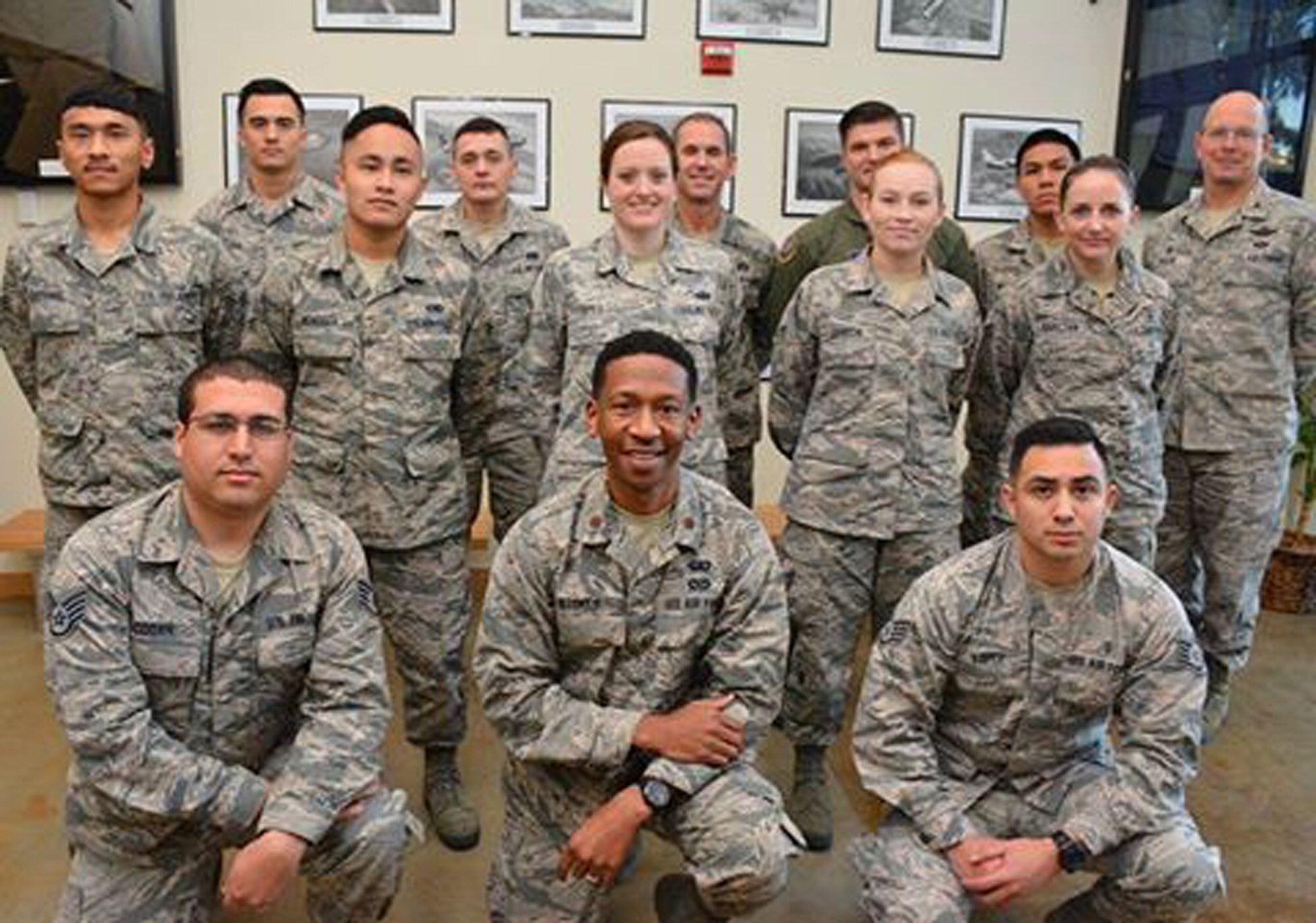 Col. Raymond A. Kozak, 349th Air Mobility Wing commander, welcomes the newest group of Citizen Airmen to the wing during the A-Flight Unit Training Assembly, Dec. 3, 2016.