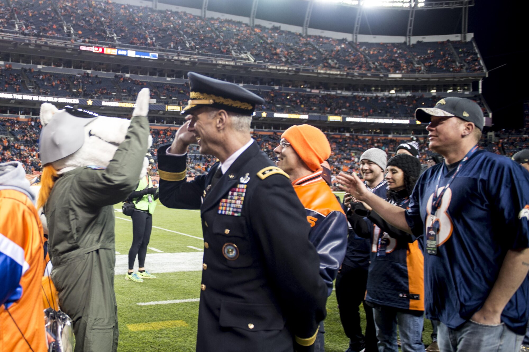 DENVER - U.S. Army Lt. Gen. Reynold Hoover, U.S. Northern Command deputy commander, meets with several Vietnam veterans in attendance at the Salute to Service football game between the Denver Broncos and the Kansas City Chiefs, Nov. 27, 2016, at Sports Authority Field at Mile High in Denver. Hoover also gave the coin from the opening coin toss to the head referee for his service in the Vietnam War. (U.S. Air Force photo by Senior Master Sgt. Chuck Marsh/Released)