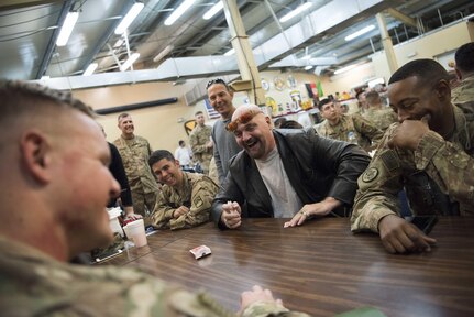 Mentalist Jim Karol performs mind games with service members during a troop engagement at Forward Operation Base Gamberi, Afghanistan, Dec. 7, 2016. Marine Gen. Joseph F. Dunford, Jr., chairman of the Joint Chiefs of Staff, along with USO entertainers, visited service members who are deployed from home during the holidays at various locations across the globe.  This year’s entertainers included actors Chris Evans, actress Scarlett Johansson, NBA Legend Ray Allen, 4-time Olympic Medalist Maya DiRado, Country Music Singer Craig Campbell, and mentalist Jim Karol. (DoD photo by Navy Petty Officer 2nd Class Dominique A. Pineiro)