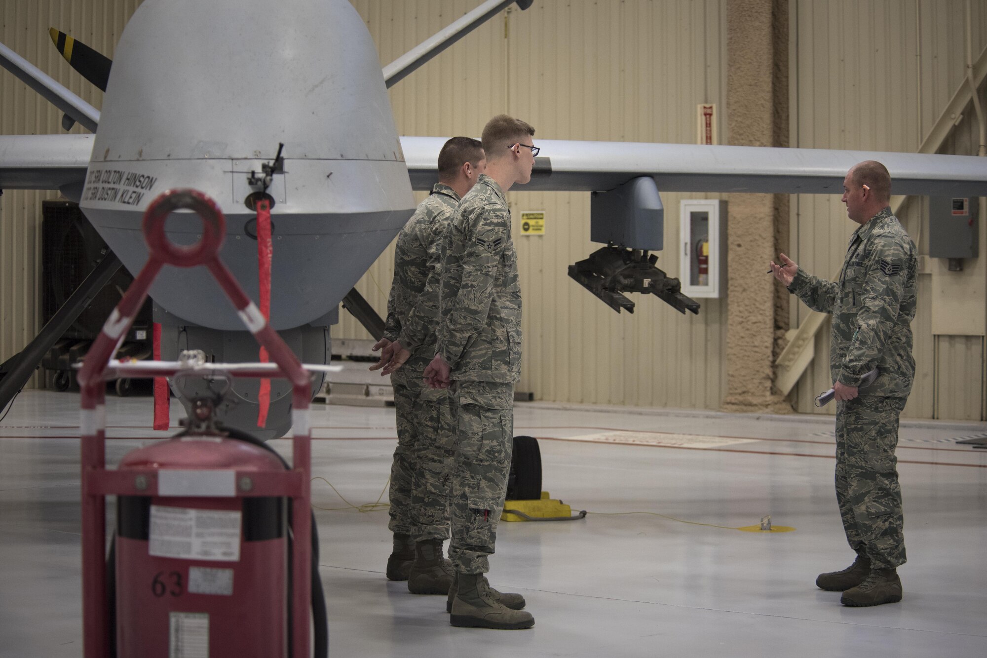 Air Commandos with the 727th Special Operations Aircraft Maintenance Squadron prepare for a weapons load competition Dec. 2, 2016, at Cannon Air Force Base, N.M. The competition tests weapons load crews’ proficiency, reliability and speed. (U.S. Air Force Photo by Senior Airman Shelby Kay-Fantozzi/released) 