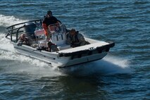 U.S. Air Force Airmen and U.S. Army Soldiers attempt a waterborne infiltration during exercise Operation Resolute Endeavor II at Joint Base Langley-Eustis, Va., Dec. 5, 2016. Airmen and Soldiers played the role of attackers who used different tactics to gain access to Third Port which was defended by 633rd Security Forces Squadron Airmen. (U.S. Air Force photo by Airman 1st Class Derek Seifert)