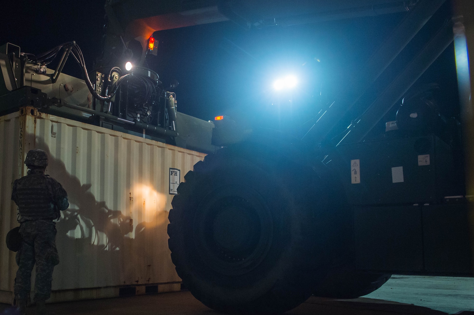 U.S. Army Soldiers move cargo during exercise Operation Resolute Endeavor II at Joint Base Langley-Eustis, Va., Dec. 7, 2016. Army personnel unloaded and secured cargo from U.S. Navy ships during the exercise. (U.S. Air Force photo by Airman 1st Class Derek Seifert)