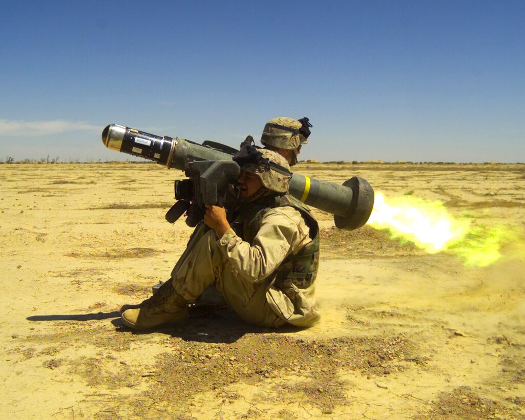 Beginning in the 1970s, the Defense Advanced Research Projects Agency began the Tank Breaker program in response to deficiencies identified by the Army and Marine Corps in their existing infantry anti-tank weapon. The Army later renamed the weapon Javelin, which entered full-scale production in 1997. It was the world’s first medium-range, one-man-portable, fire-and-forget anti-tank weapon system. Here, a soldier fires an FGM-148 Javelin anti-tank weapon, May 2, 2003. Marine Corps photo by Sgt. Mauricio Campino